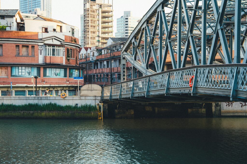 A quiet riverside walkway in Porto during the early evening.