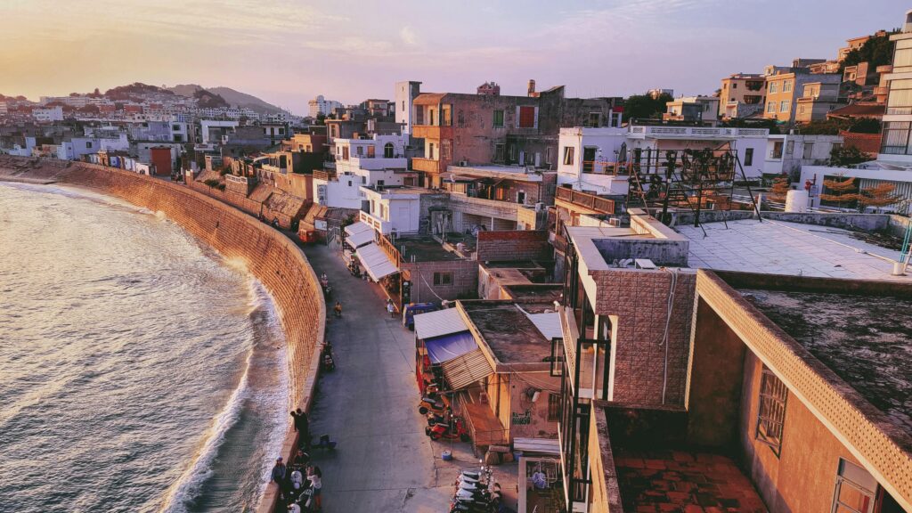 Colorful riverside buildings in Porto overlooking the Douro River.