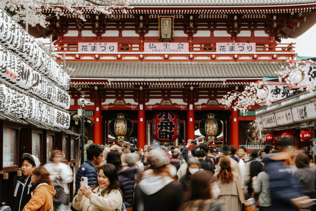 Travelers experiencing traditional festivals abroad 1